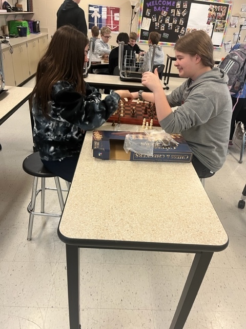 Two students play chess